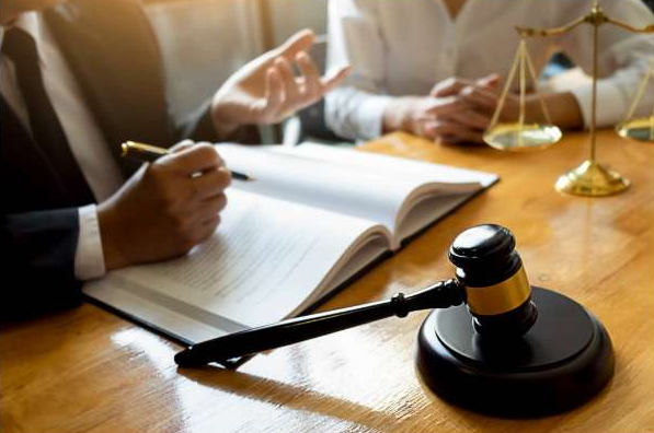 attorney and client speaking about litigation