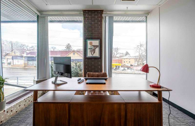 Erin's desk with window behind it