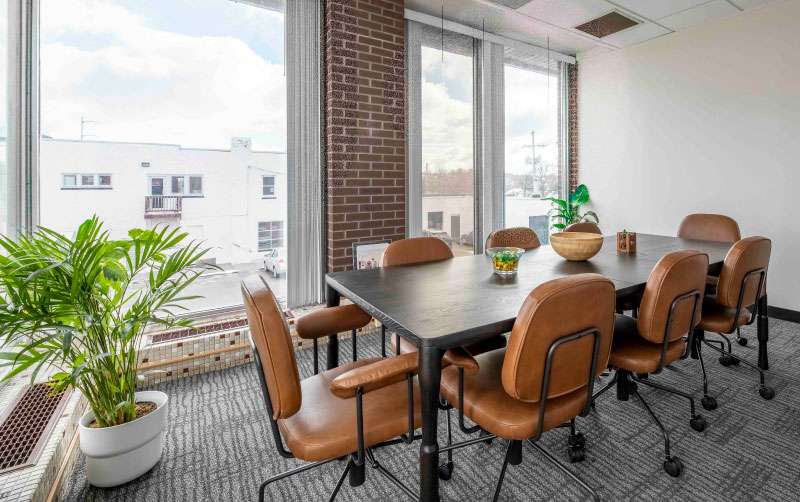 conference table with chairs around it